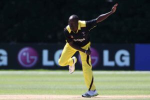 Frank Nsubuga bowls Joel Ford / © ICC/Getty Images